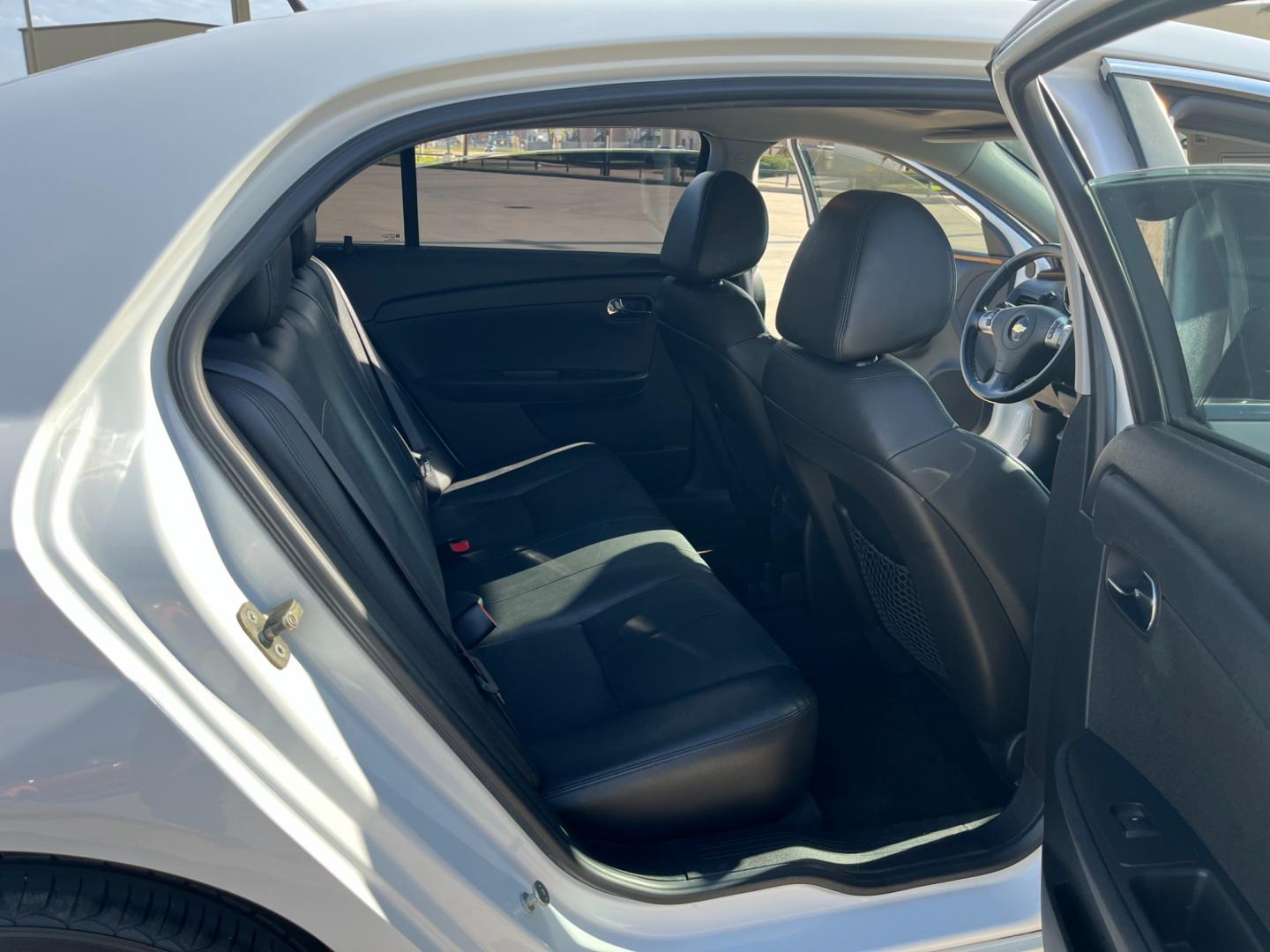 2010 white /black Chevrolet Malibu 2LT (1G1ZD5E09AF) with an 2.4L L4 DOHC 16V engine, 6-Speed Automatic transmission, located at 14700 Tomball Parkway 249, Houston, TX, 77086, (281) 444-2200, 29.928619, -95.504074 - Photo#12